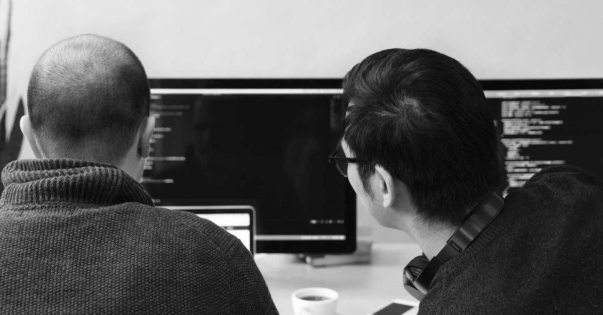 Two Developers Reviewing Code